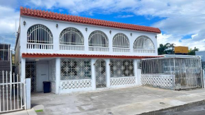 Large Group Stay for 15 Guests Near Beaches & Airport